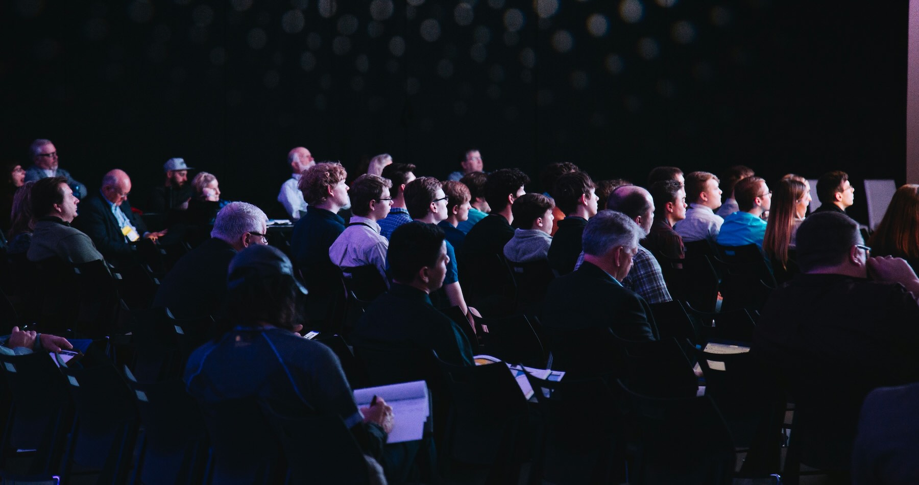 Image of people at a conference depicted for Event Videography 