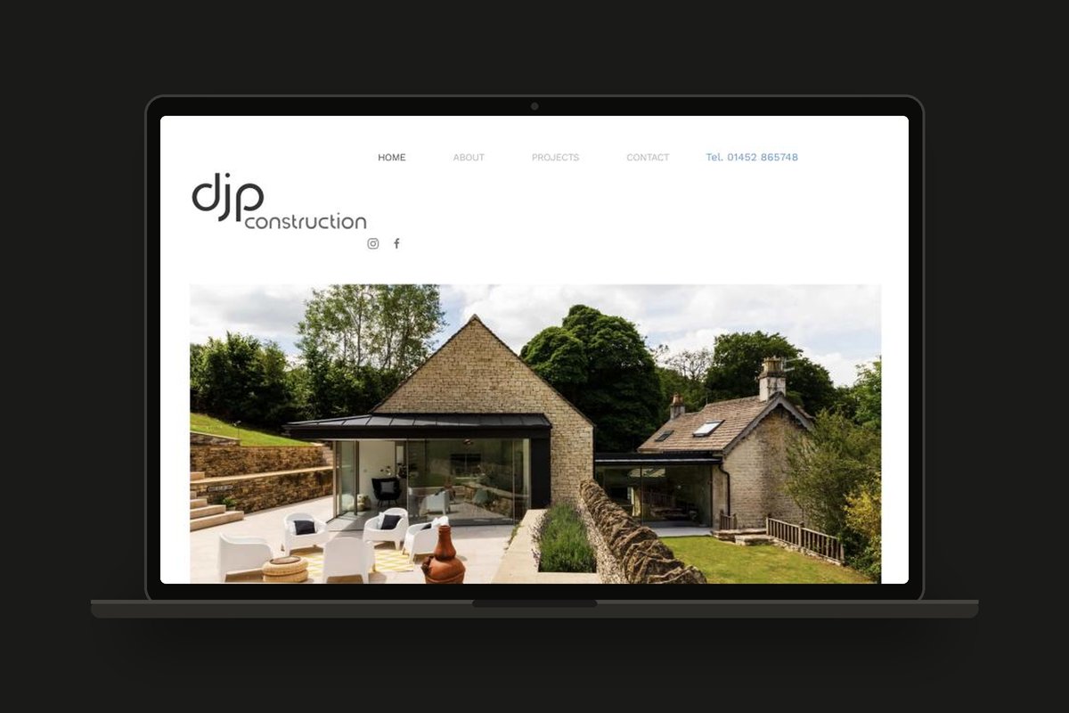 DJP Construction website showing a Cotswold stone house with glass extension, designed by Swanky Pixels
