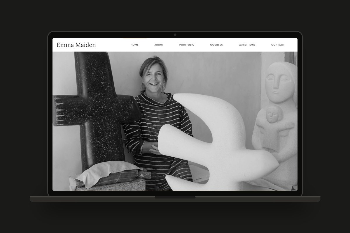 Emma Maiden sculptor website showing her in the studio with stone carvings, designed by Swanky Pixels