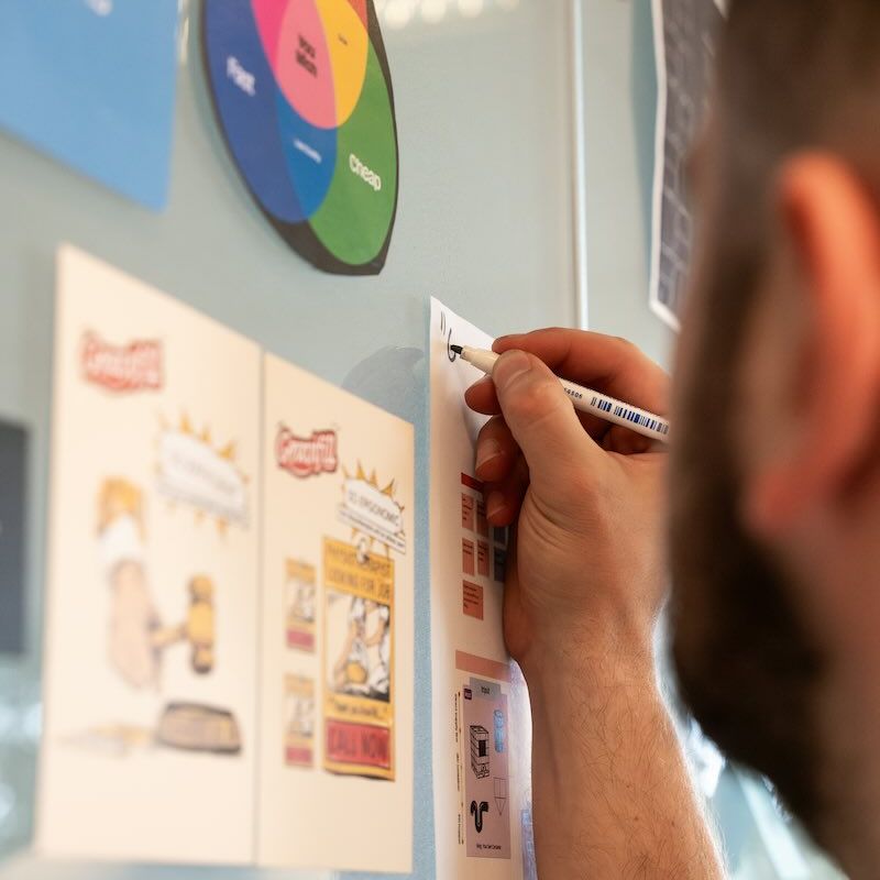 Designer planning website content, branding and page structure