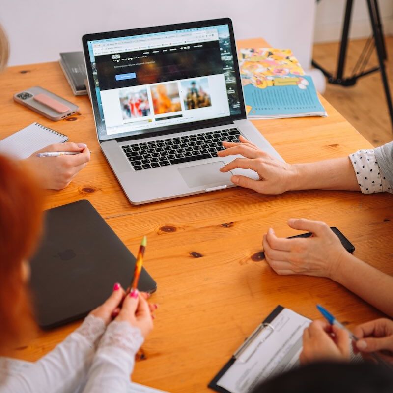 Team planning website services, page structure and customer journeys